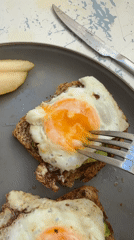 Breakfast scene documented in Buenos Aires featuring avocado toast