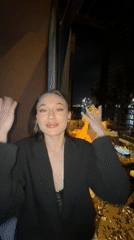 Nighttime celebration with dancing and confetti at Dubai karaoke lounge