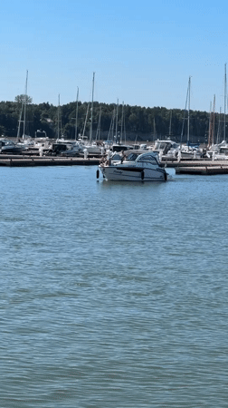 Tallinn harbor buzzing with boats and jet skis on a summer afternoon