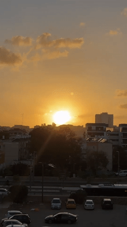 Sunset observed over Bat Yam cityscape, Israel