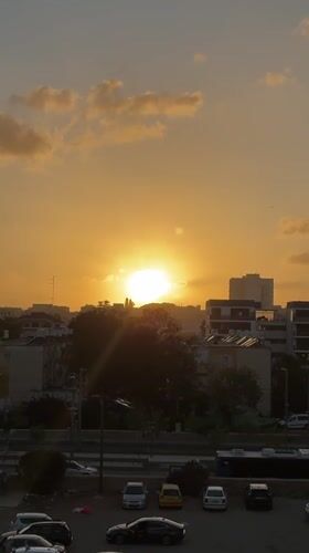 Sunset observed over Bat Yam cityscape, Israel