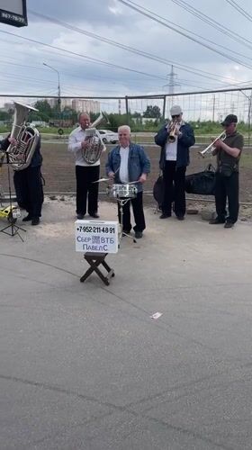 Brass band performs outdoor concert in Murino, Russia