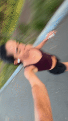 Joggers exercise on paved path in Mexico City park
