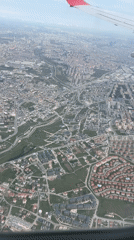 Aerial view captures Turkish urban landscape from airplane window