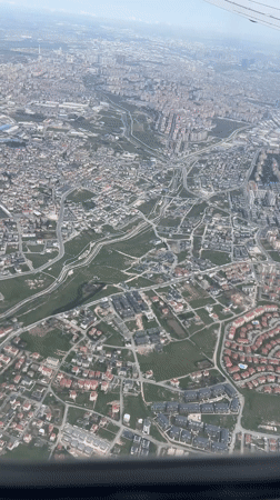 Aerial view captures Turkish urban landscape from airplane window