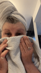 Person with towels, garden scene observed in Chambœuf