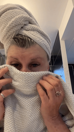 Person with towels, garden scene observed in Chambœuf