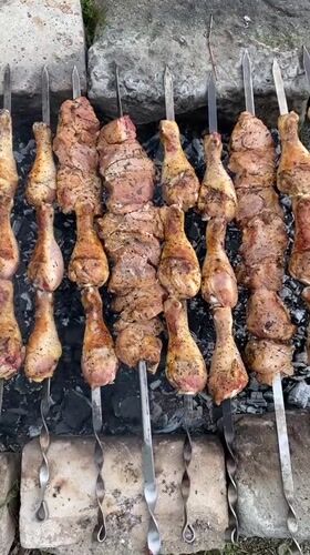 Outdoor grilling and utility lines observed in Gyumri