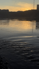 Sunset documented along rocky rivershore in Krasnoyarsk, Russia