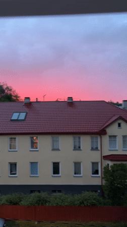 Tallinn residential streets glow under a dramatic summer sunset