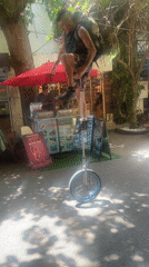 Tourist documents afternoon in Playa del Carmen with haircut, pizza