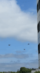 Military helicopters fly formation over Santiago de Compostela