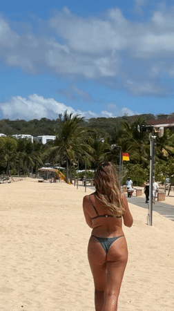 Early morning beach activities documented in Kuta Selatan