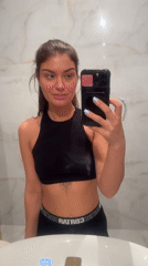 Woman takes bathroom selfie in Moscow