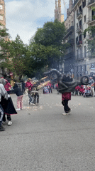 Street performers with drums and pyrotechnics draw crowds in Barcelona