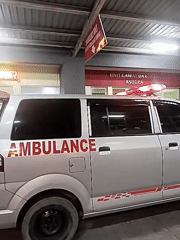 Ambulances active at Banda Aceh hospital facility during evening hours