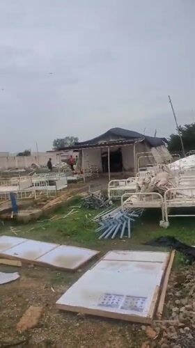 Hospital beds scattered outdoors in Bauchi, Nigeria