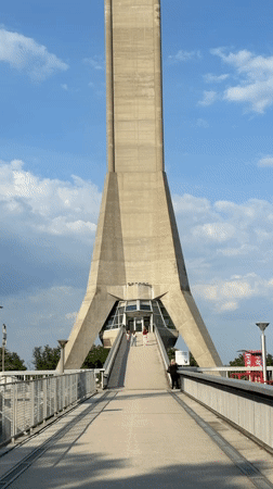Visitor documents Avala Tower from multiple angles in Belgrade