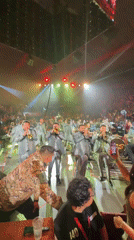Banda MS performs for packed arena crowd in matching suits