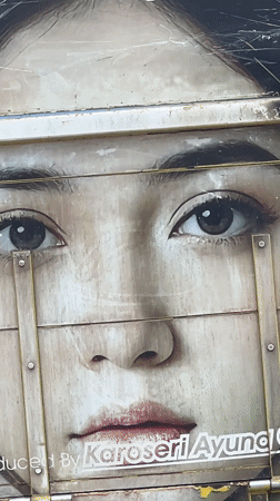 Yellow truck with woman's portrait spotted in Sukawati