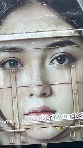 Yellow truck with woman's portrait spotted in Sukawati