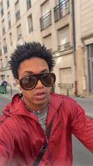 Cyclist spotted wearing designer sunglasses, track jacket in Paris