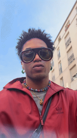 Cyclist spotted wearing designer sunglasses, track jacket in Paris