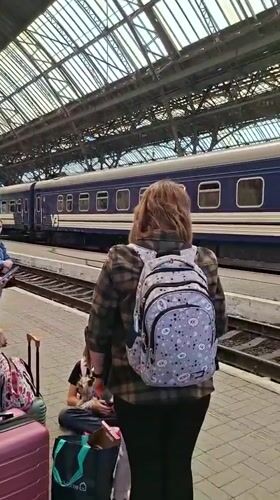 Train platform and open skies over Lviv on a July morning