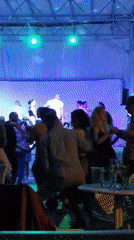 Evening dance party observed in Prague with colorful lighting
