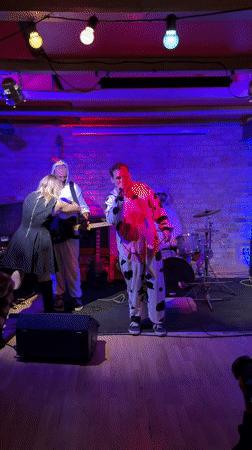 Costumed band performs at small Riga venue