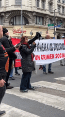 Pensioner rights protesters march through Buenos Aires crosswalk