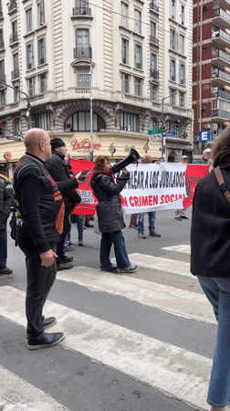 Pensioner rights protesters march through Buenos Aires crosswalk