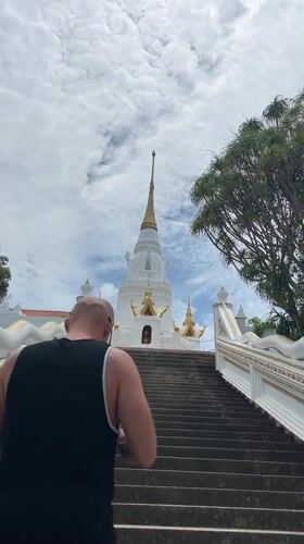 Early morning temple visit captured at Buddhist stupa Thailand