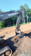 Excavator performs earthwork at Oktyabrsky construction site