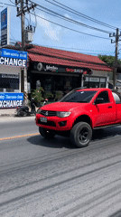 Early morning traffic flows through Baan Bo Phut streets