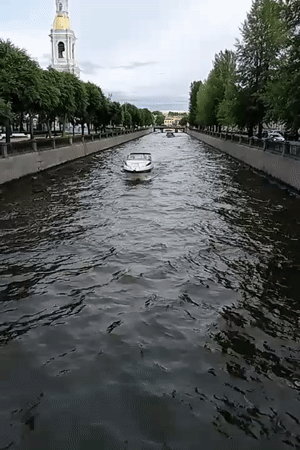 Afternoon along Saint Petersburg's canals, boats and city life