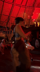 Nightclub scene with dancing and DJ performance in Kediri