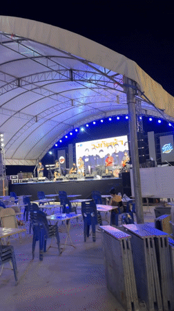 Band วงทัพห้า performs concert under tent in Thailand