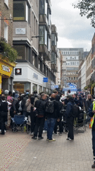 London crowds queue at Swatch store amid toy vending activity