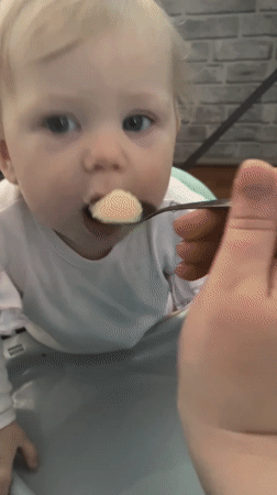 Baby feeding time captured in Vesyoloye, Russia