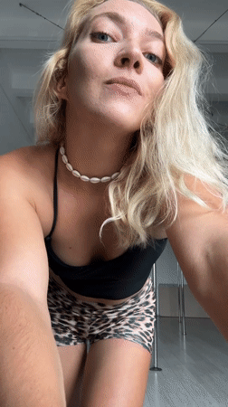 Woman documents pole fitness session at Minsk studio
