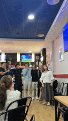 Young men sing karaoke at San Sebastián restaurant Thursday evening