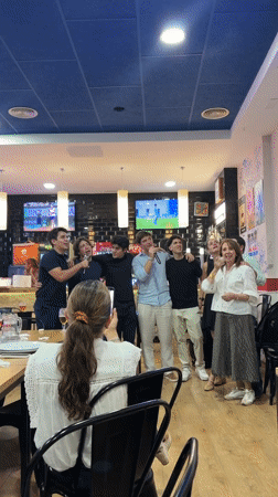 Young men sing karaoke at San Sebastián restaurant Thursday evening