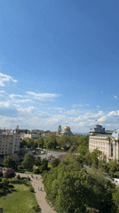 Tourist enjoys Ferris wheel ride with city views in Sofia