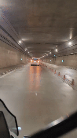Inside a newly built tunnel in Himachal Pradesh, traffic moving through