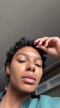 Person rests on couch during morning hours in Champs-sur-Marne