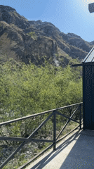 Mountain waterfall captured on video from patio viewpoint
