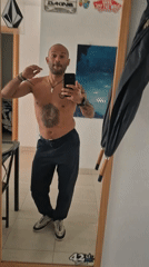 Man films himself shirtless with lion tattoo in Barcelona mirror