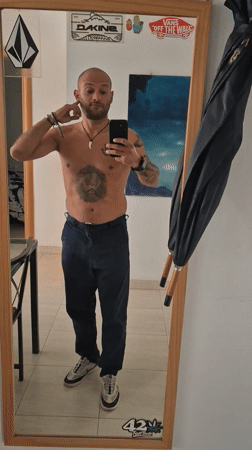 Man films himself shirtless with lion tattoo in Barcelona mirror