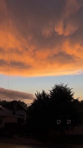 Hookah evening in Klin as a dramatic sunset unfolds outside